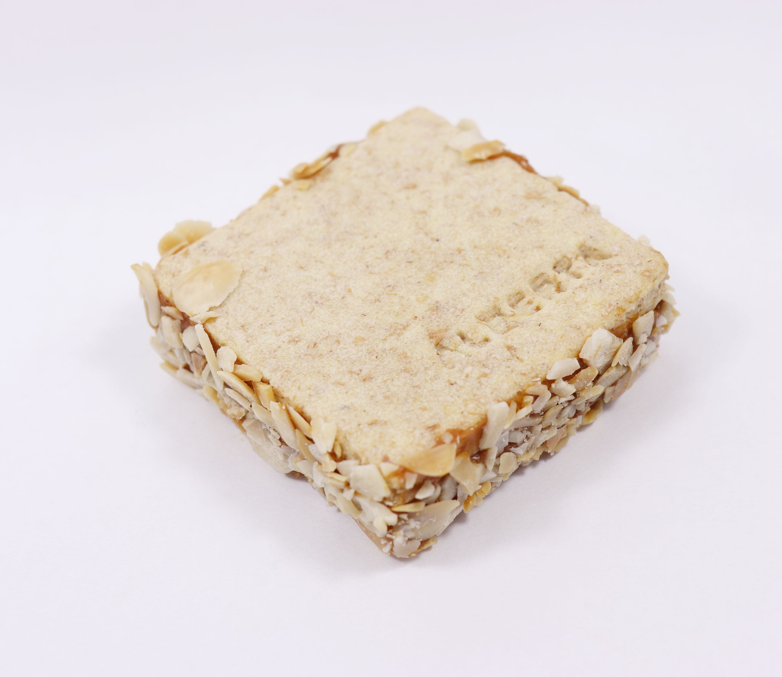 Alfajor integral de dulce de leche y almendras